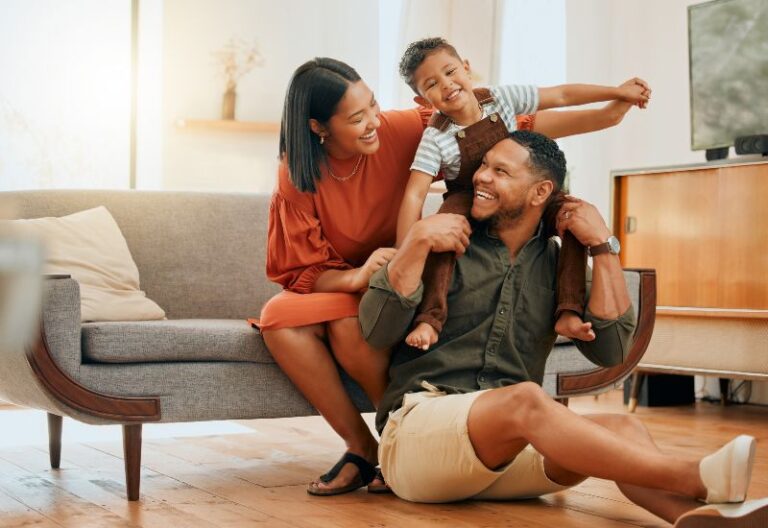 Family of three spending family time indoors