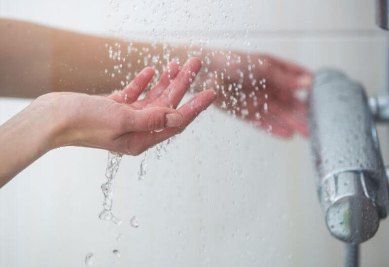 Testing Water Temperature with Hands