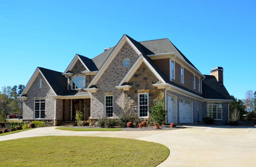 A big house with a driveway for parking